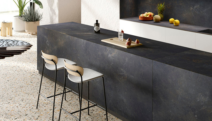 Sapienstone Black Diamond sparkling kitchen counter with gold and bronze metallic effects.